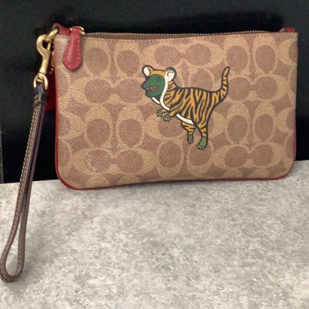 Coach Brown Wristlet with Dinosaur/Tiger Print